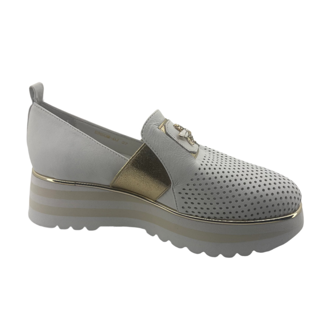 White and gold shoe on a white background