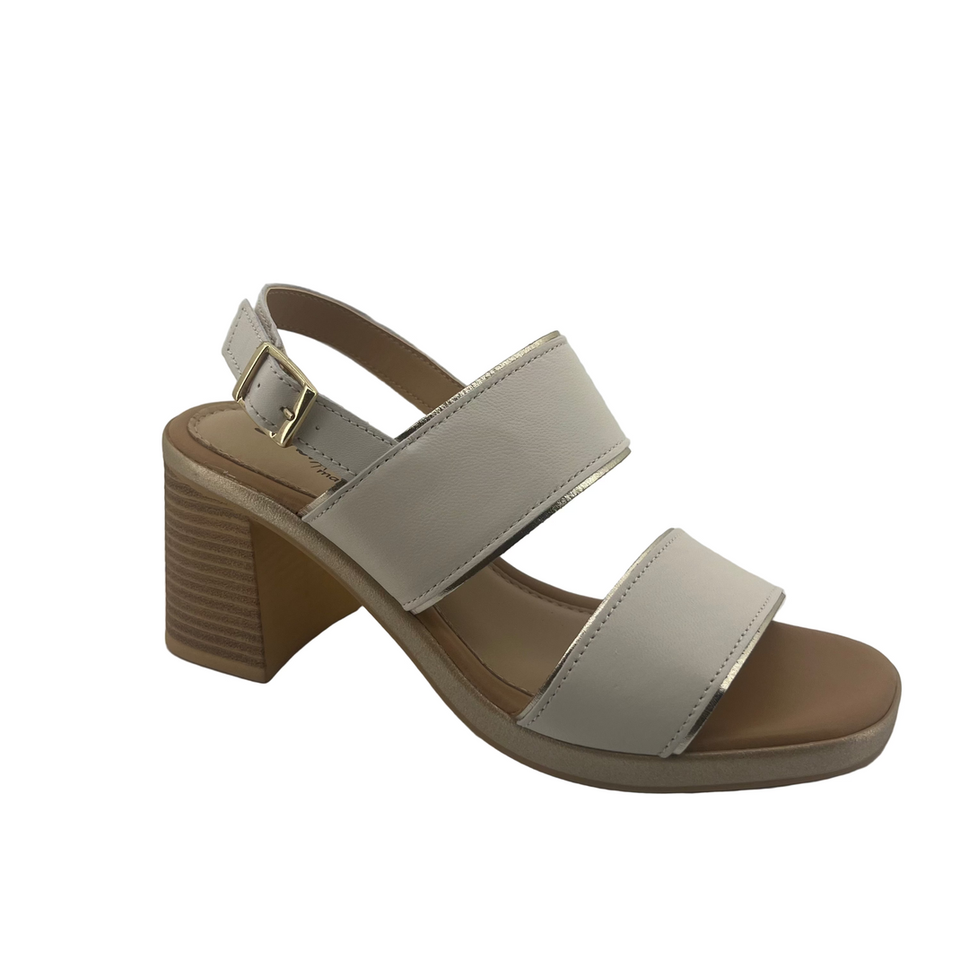 Beige sandal with a block heel on a white background