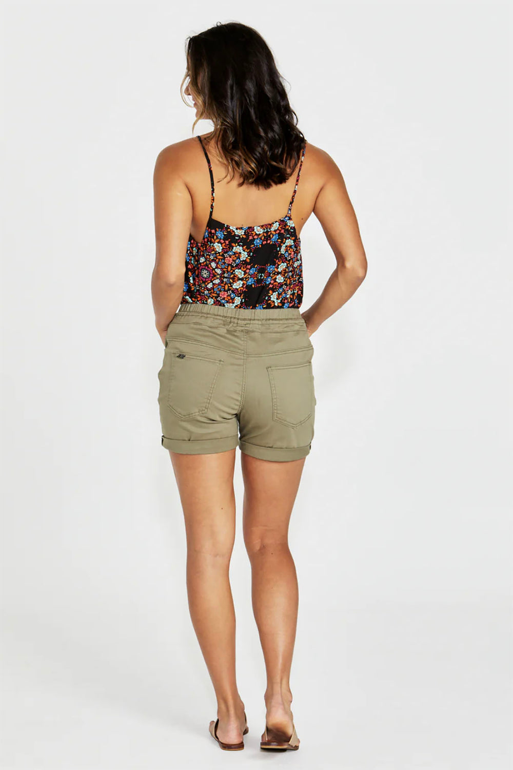 Woman wearing the NLJ rye shorts in khaki by Pizazz Boutique Nelson Bay back view
