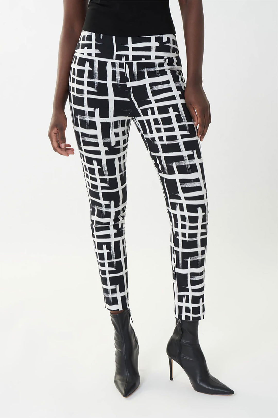 Woman wearing the block inspired pant in black & white by Joseph Ribkoff, sold and shipped from Pizazz Boutique Nelson Bay women's dresses online Australia