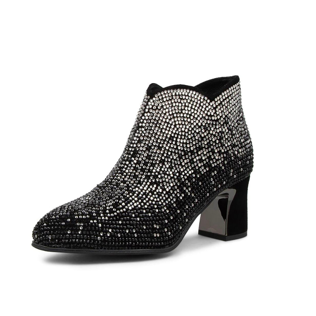 If you are looking for a statement piece look no further the Jonsy Ankle Boots by Django & Juliette in soft leather covered in glittering rhinestones are the ones for you.     Brand Django & juliette Style Code : Jonsy-DJ Women's heeled ankle boots Side fastening zip  Block Heel  Colour Black   Leather upper Leather Lining 