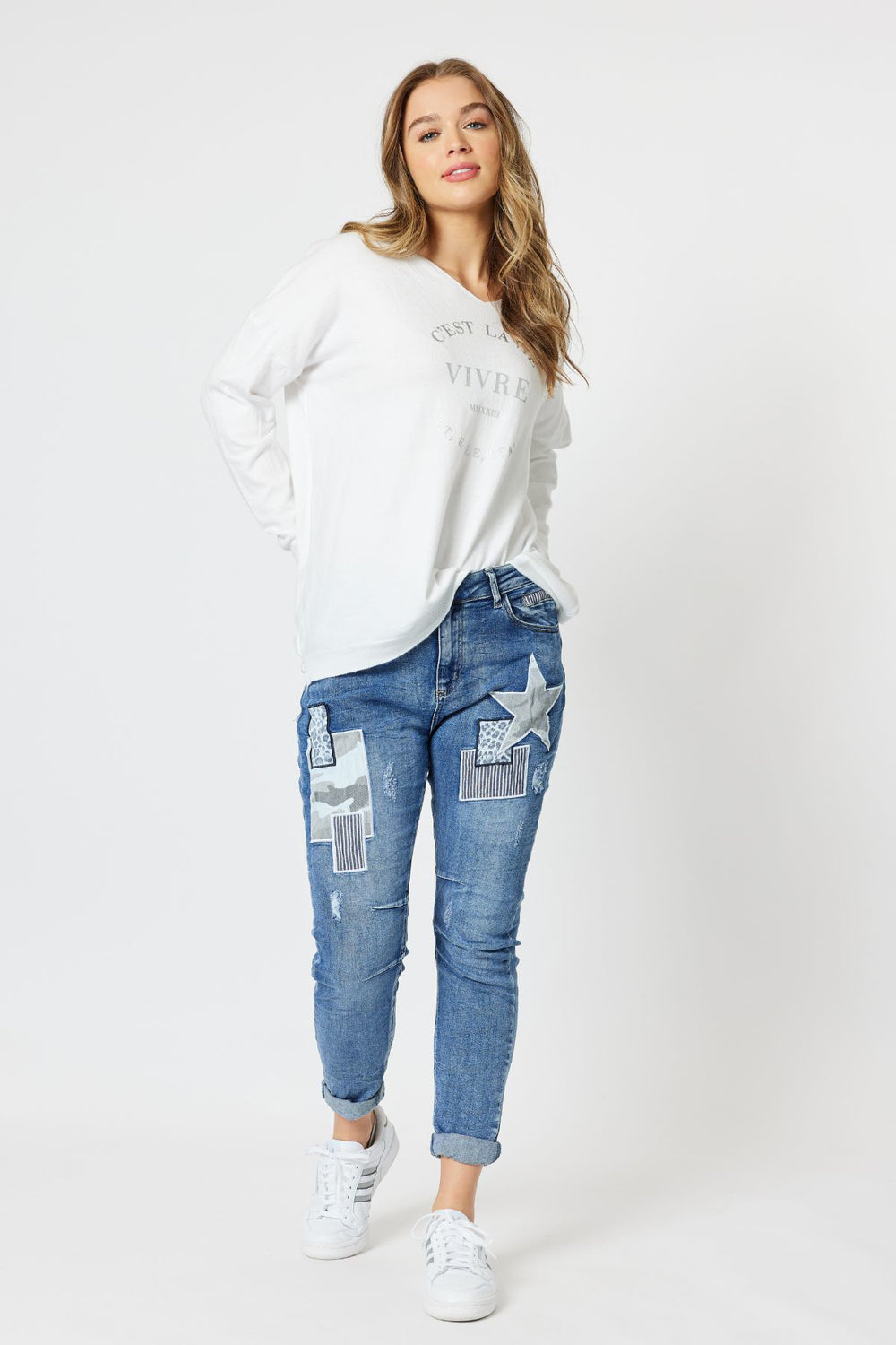 Looking for your next pair of jeans, look no further than the Stella Patch Jean by Threadz. Featuring a fun patchwork on the front, slim leg, zip fly with a mid - high rise. Wear full length or roll them up for a cuffed look. Super comfy and easy to wear!  Brand : Threadz Style Code : 42897 Fabric : 98 % Cotton 2% Elastane This garment is designed to fade lose colour Cold machine wash  Classic 5 pocket denim design Washed denim look Mid - High rise Slim leg fit Stretch fit