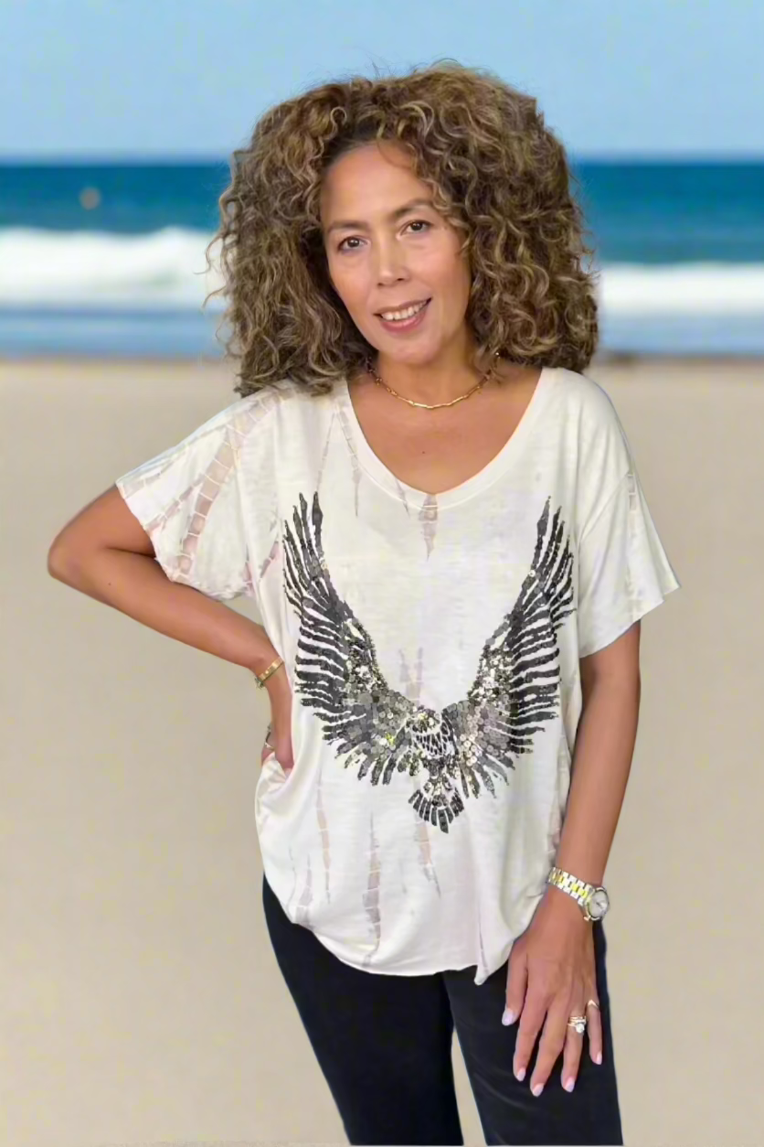 lady in phoenix tee on the street 