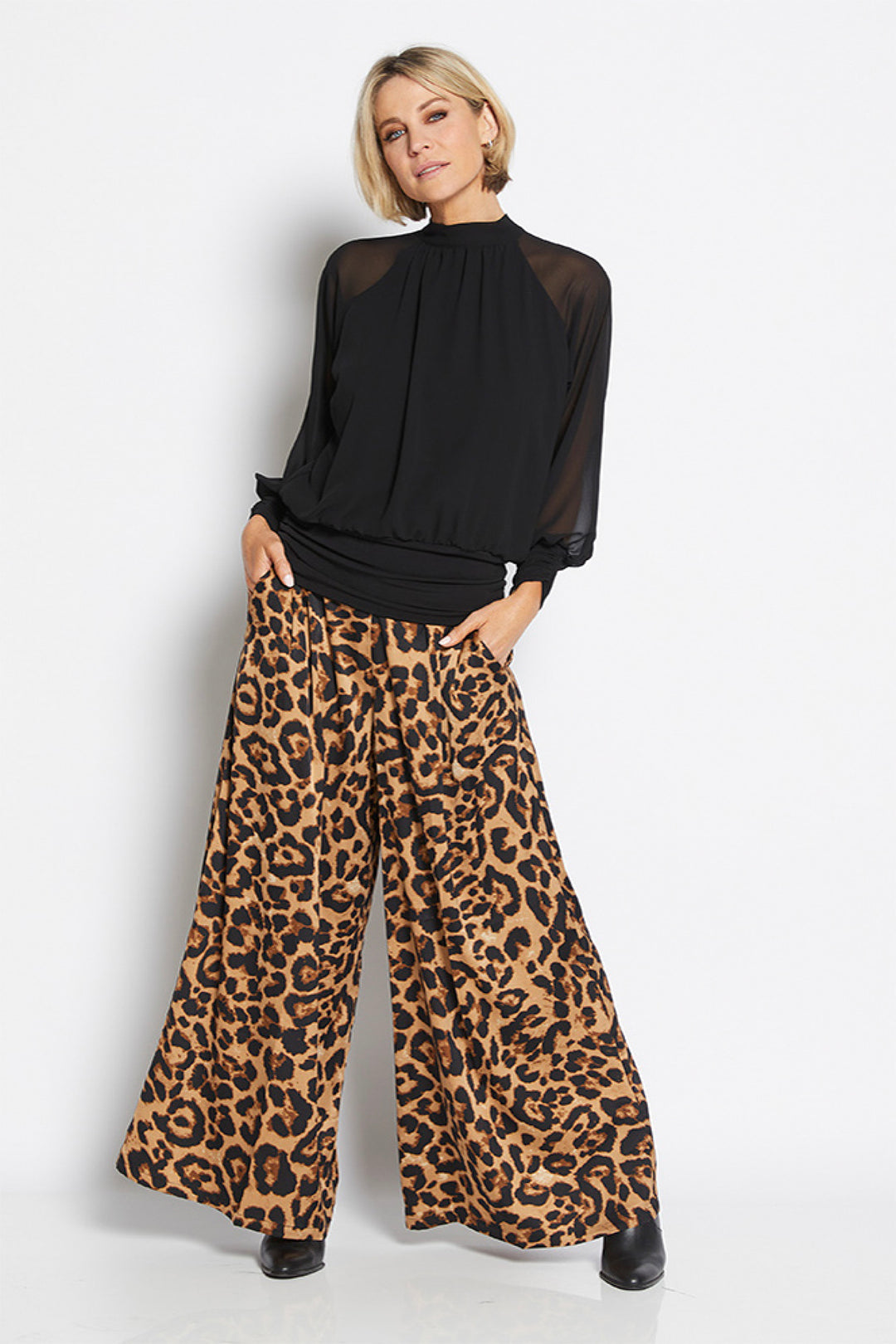 Francine extra wide leg pant in tan & black animal print by Philosophy Australia.  Polyester fabric, side pockets, elastic waistband, two front pleats from waist.