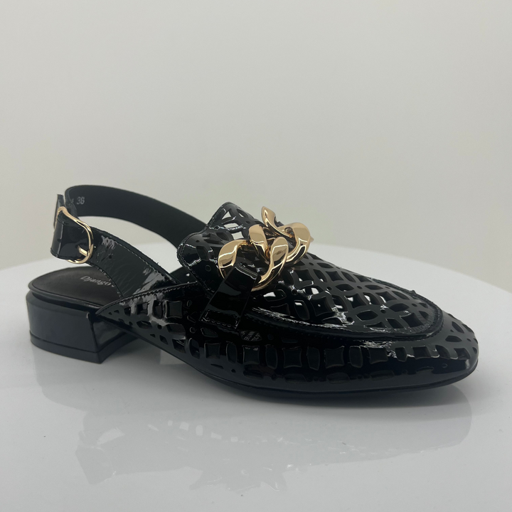 Black embellished sandal with gold accents on a white background