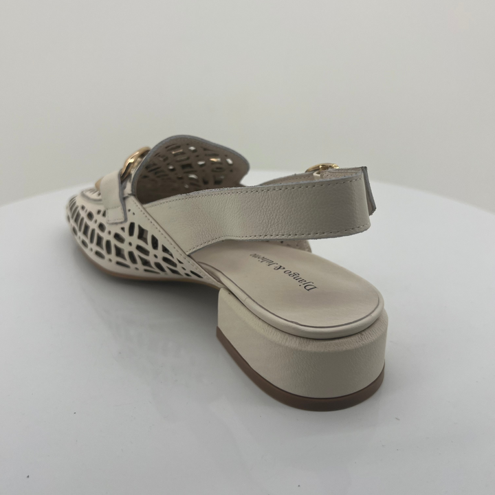 Ivory Sandal with cut-out design on a white background