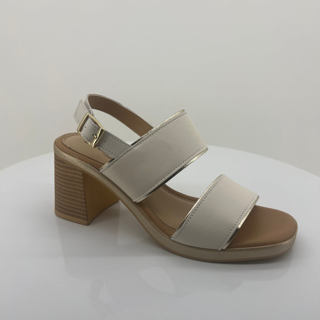 Beige sandal with a block heel on a white background