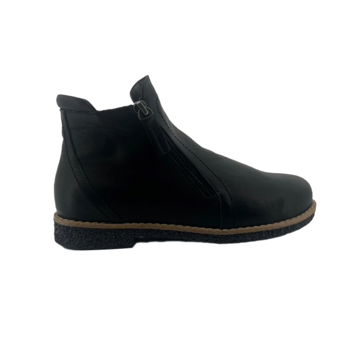 One black ankle boot with side zips 