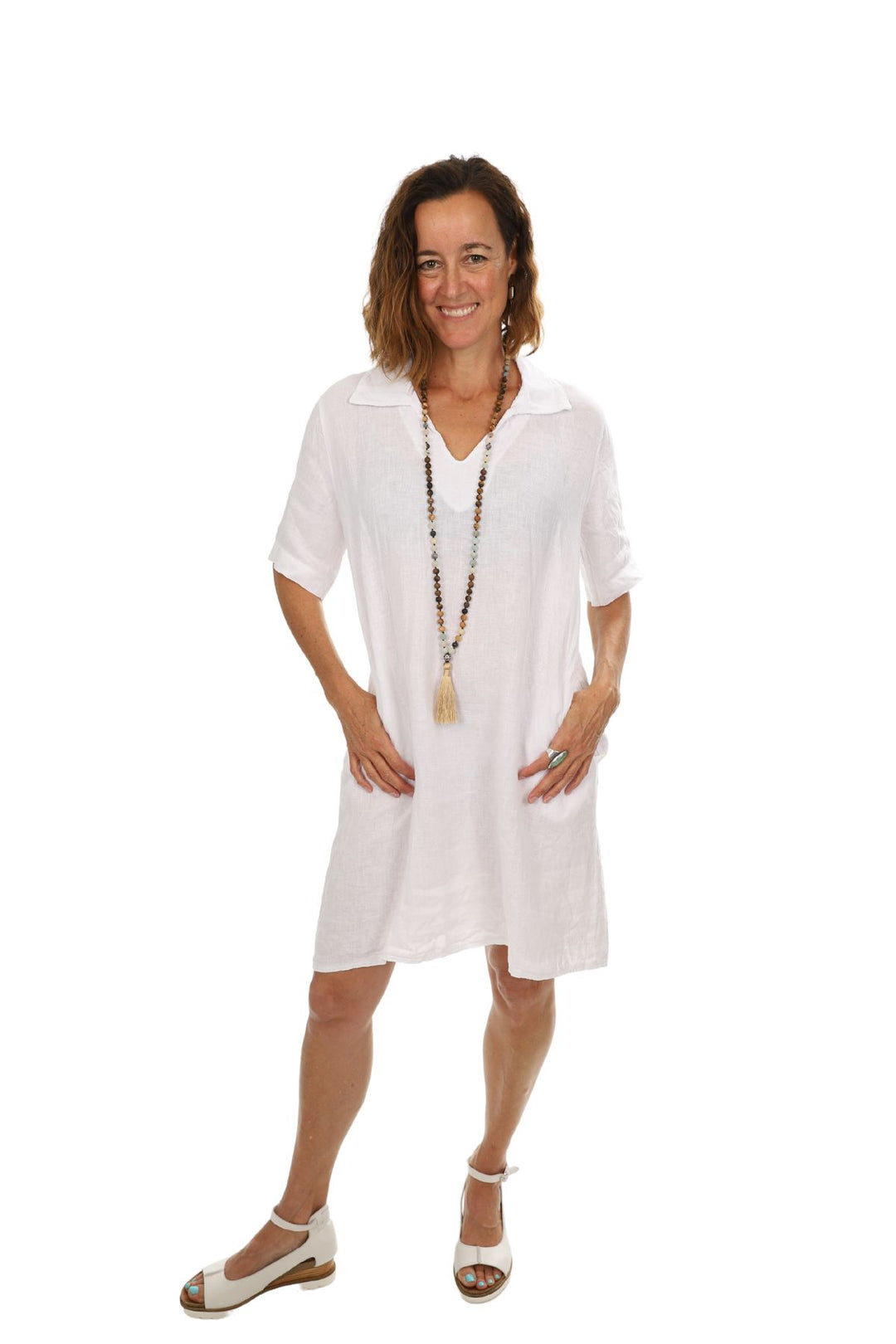 Woman wearing a 100% linen dress by So French SO Chic, sold and shipped from Pizazz Boutique online women's clothes shops Australia
