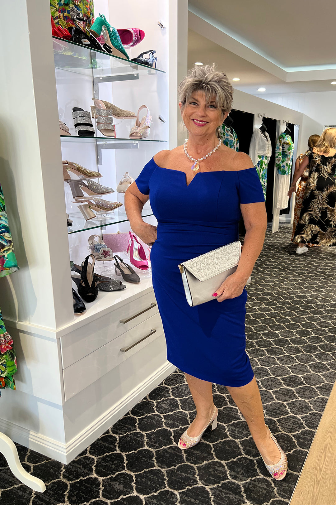 woman wearing the Ariella crepe dress in royal by Zaliea, sold and shipped from Pizazz Boutique Nelson Bay women's dresses online Australia