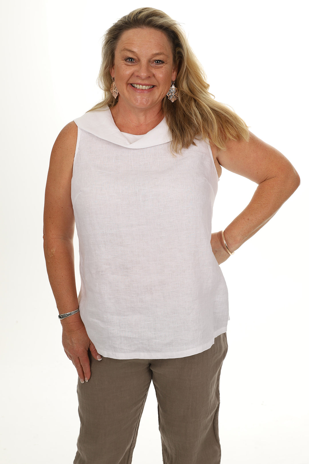 Woman wearing a white cowl neck top by See Saw clothing, sold and shipped from Pizazz Boutique Nelson Bay online women's clothes shops Australia