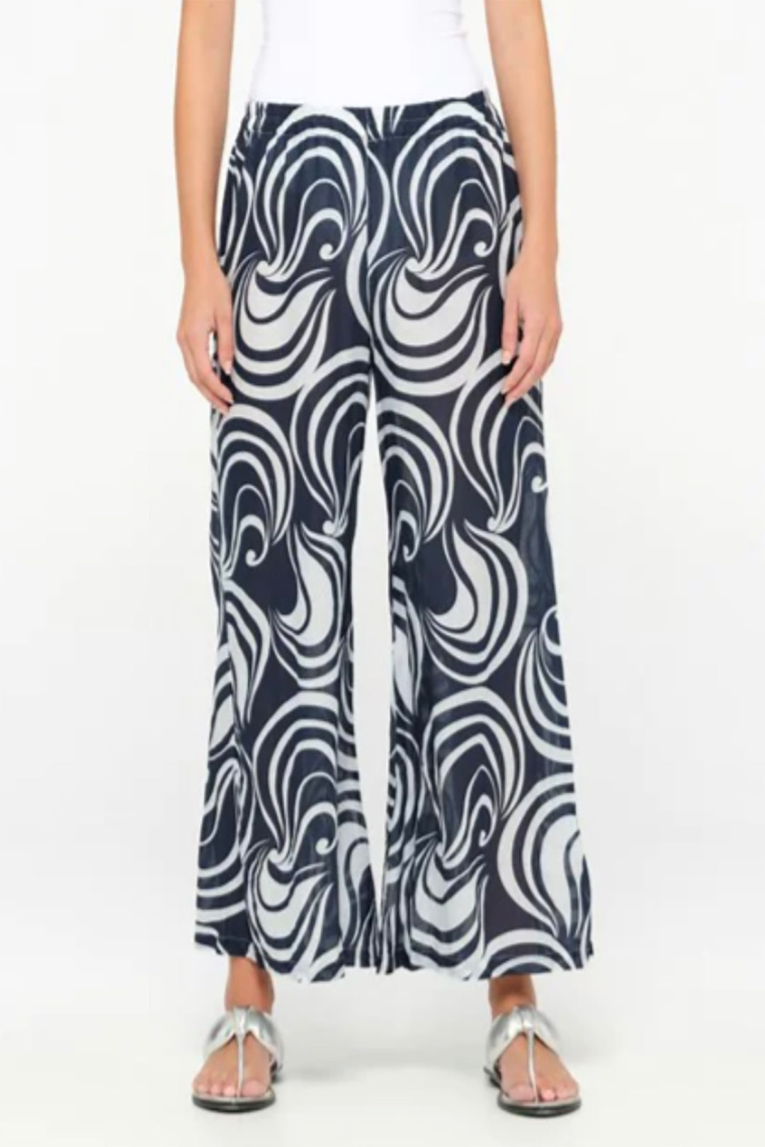 Photo of lady standing in Palazzo pants baros-cotton-white by Oneseason Australia.