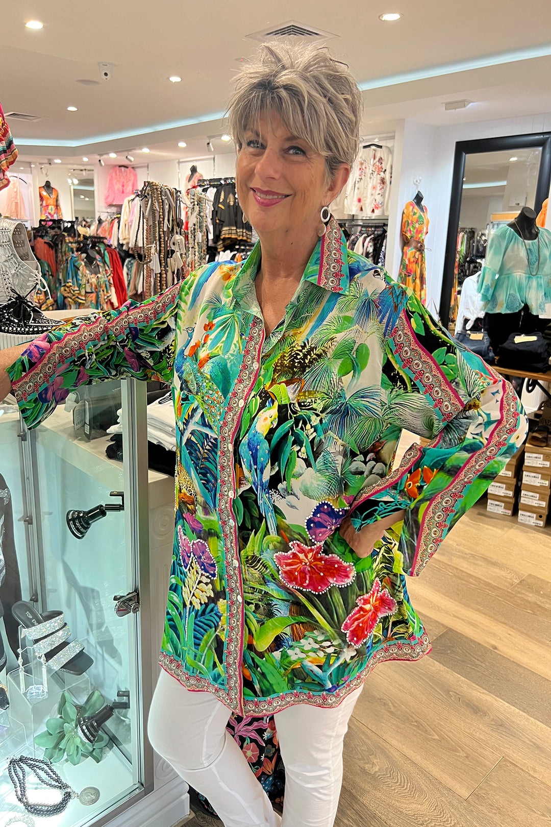 Woman wearing a silk paradise shirt by Fashion Spectrum, Sold and shipped from Pizazz Boutique Nelson Bay dress shops online Australia