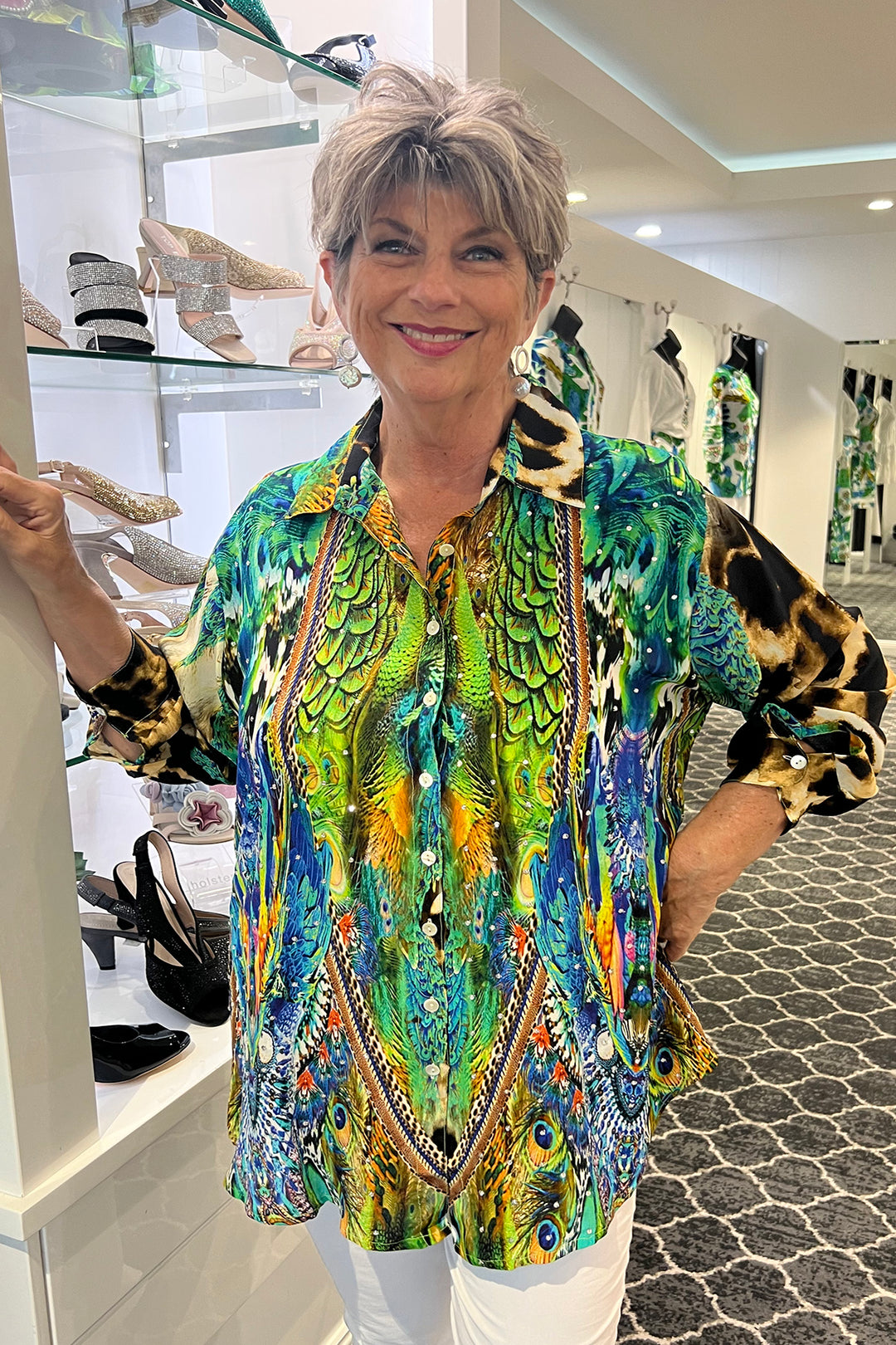 Woman wearing a silk peacock shirt by Fashion Spectrum, sold and shipped from Pizazz Boutique Nelson Bay Women's Clothing Stores Online Australia front view