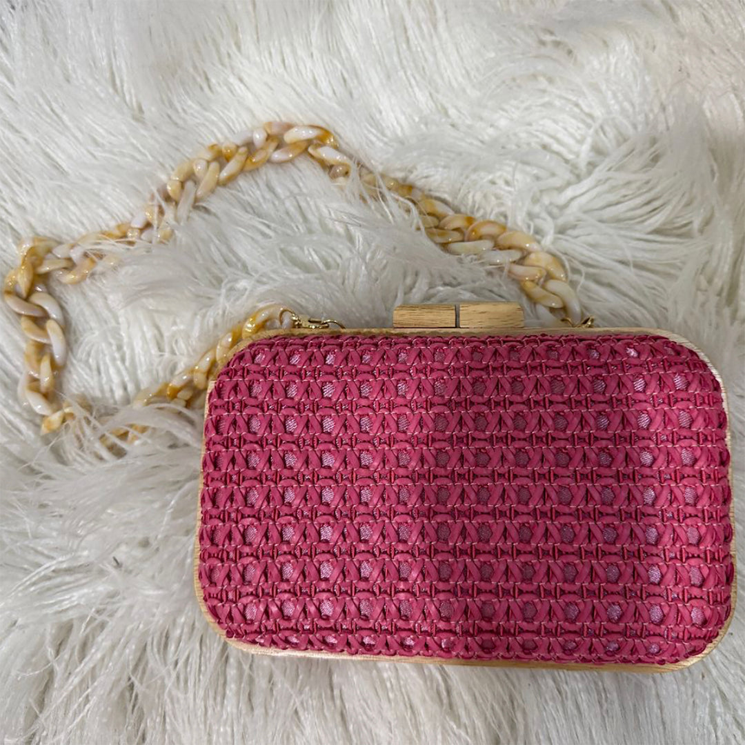 Timber frame clutch bag in fuchsia, sold and shipped from Pizazz Boutique online women's clothes shops Australia