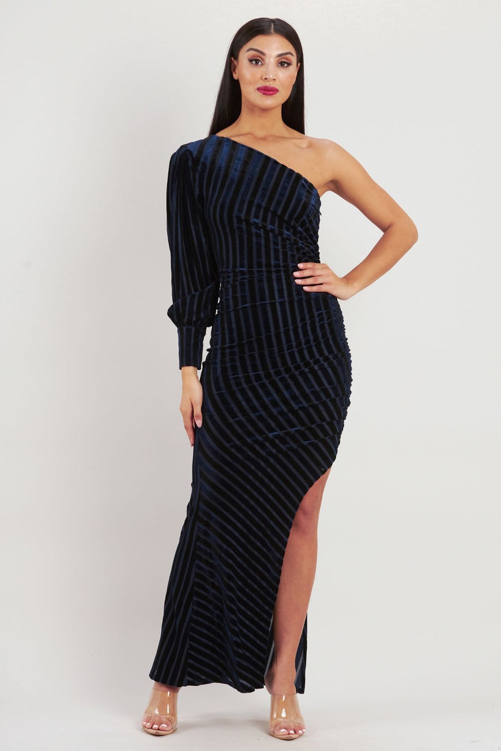 Make an impression in the Addison Maxi Dress by Romance. With its one sleeve design and figure hugging and flattering silhouette this dress certainly exudes timeless glamour.  Brand : Romance Style Code : RM231101 Colour : Navy Midweight Moderate stretch One shoulder neckline Single sleeve with button cuff Side split