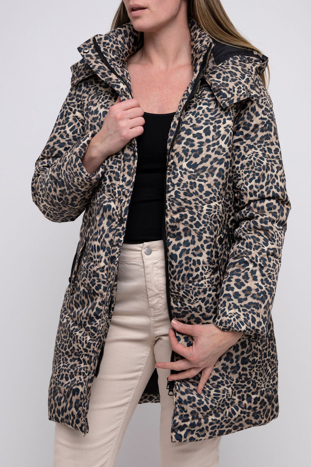 Woman wearing an animal puffer jacket by Pink Pong, sold and shipped from Pizazz Boutique Nelson Bay women's dresses online Australia front view