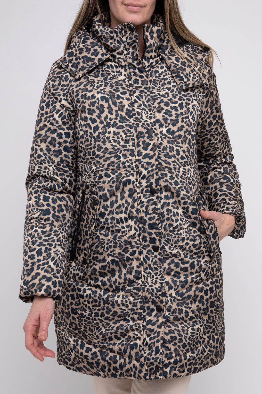 Woman wearing an animal puffer jacket by Pink Pong, sold and shipped from Pizazz Boutique Nelson Bay women's dresses online Australia front view