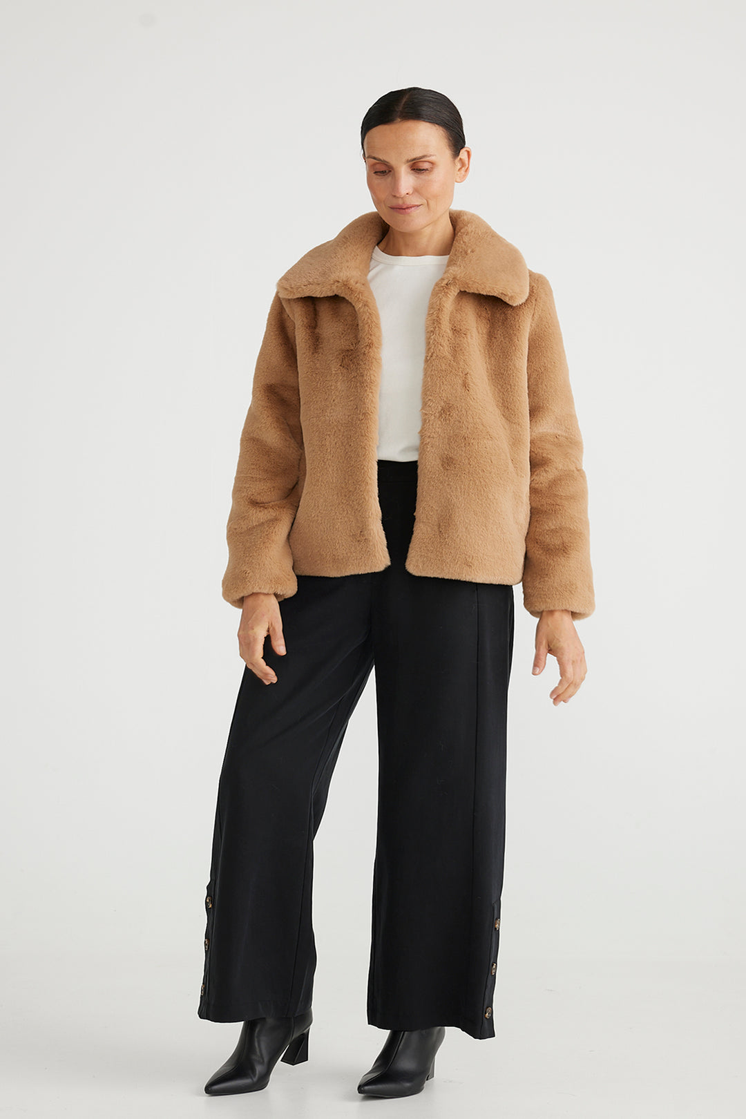 Transport to a wonderland of warmth in the Steinway Jacket, clip metal closure, an oversized collar, this jacket will keep you cozy and on trend all season.   Brand Brave & True  Style BT6765-3 Colour Biscotti ( Beige ) 100% Polyester Hip Length collared Jacket Faux Fur Fully Lined  Side Pockets 