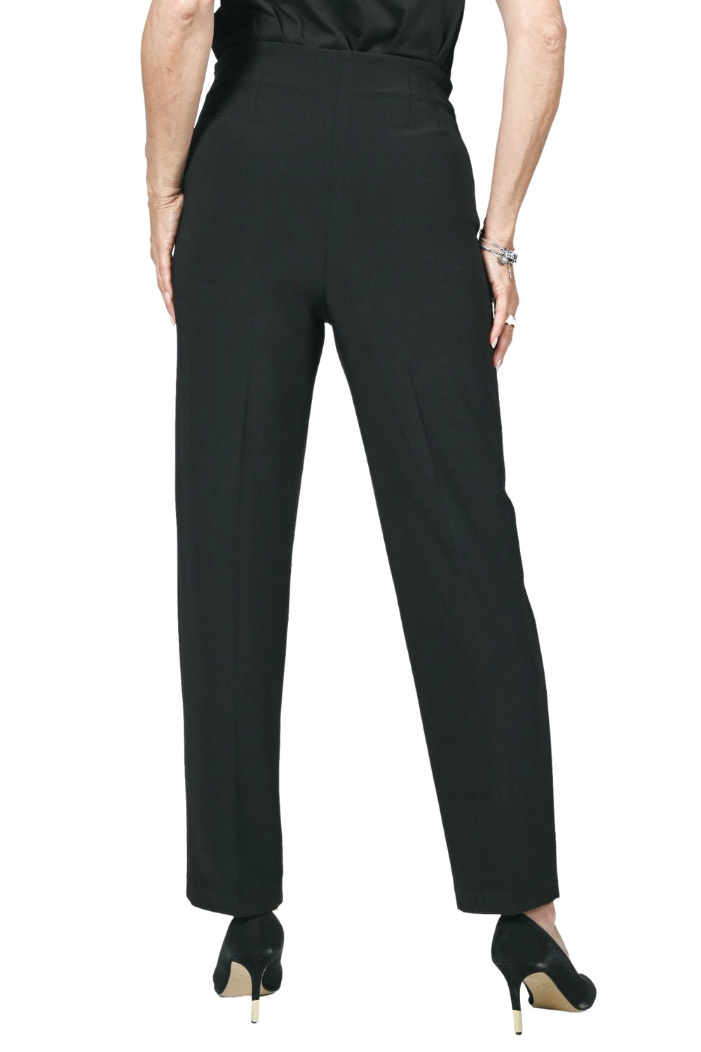 Woman wearing a pair of black knit pants by Frank Lyman , Sold and shipped from Pizazz Boutique
