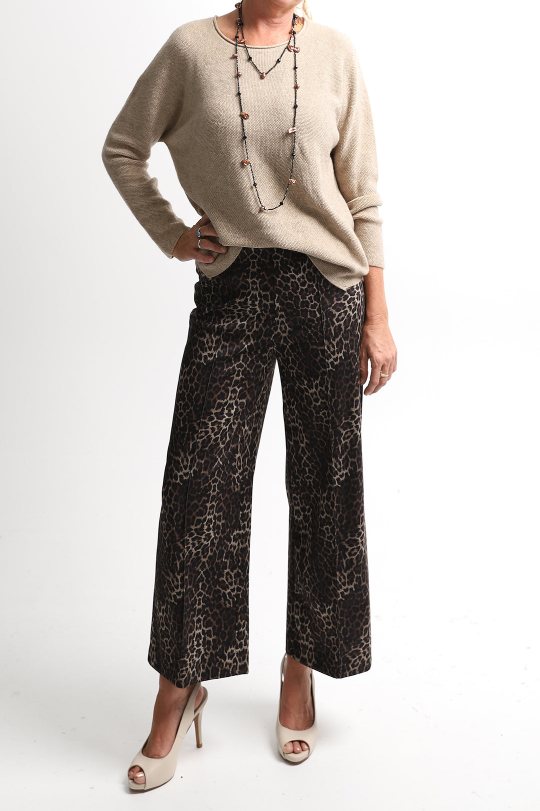 Woman wearing a pair of black pants by Frank Lyman from Pizazz Boutique Nelson 