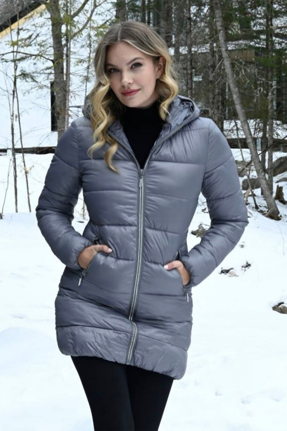 Woman wearing a grey puffer by Frank Lyman from Pizazz Boutique Nelson Bay