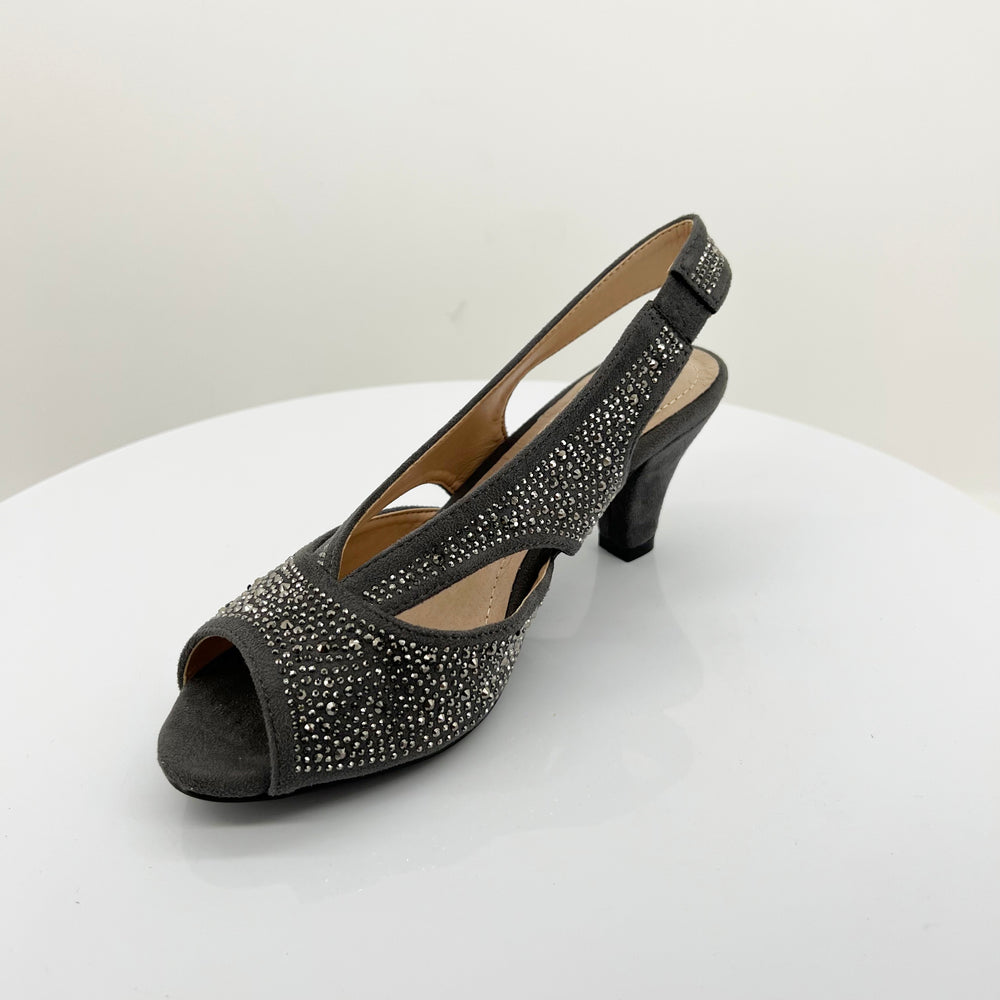 The Nagle Emily Shimmer Heel by Clarice showcases a stunning luxurious and glamorous look. Boasting a flattering open toe and two inch heel, these pumps are embossed with scatterings of sparkle to create a bejewelled finish that we love.  Brand : Clarice Style Code : Nagle Colour : Grey Micro Synthetic Upper  Leather Sock Open Toe Elastic Ankle Strap
