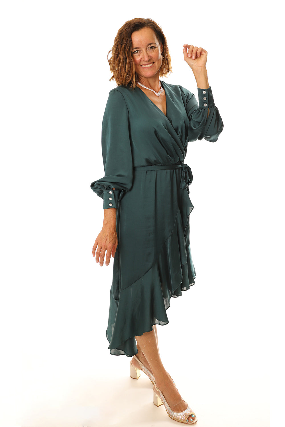 Woman wearing a silk dress by Frank Lyman at Pizazz Boutique Nelson Bay