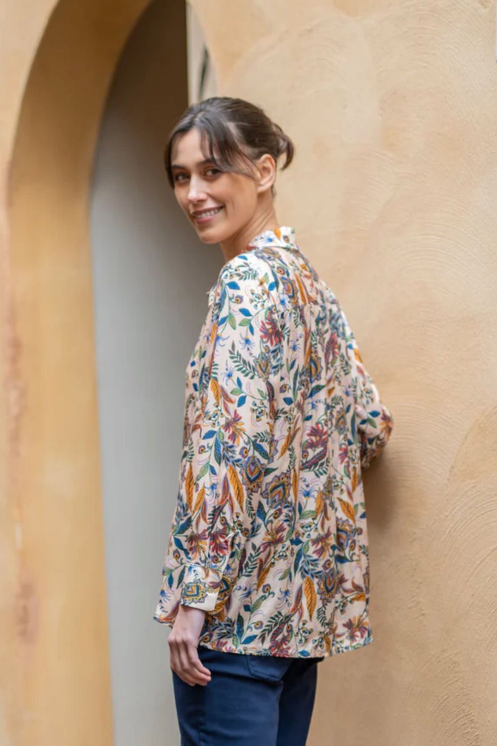 This luxurious Lola Shirt French Floral by MILSON is an easy to wear blouse featuring a collar and button down front in beautifully draped silk viscose.   Brand : MILSON Style Code : ML2152 French Colour : Ochre 100% Viscose Cold Hand wash Made in Italy  Buttons down the front Button Cuff